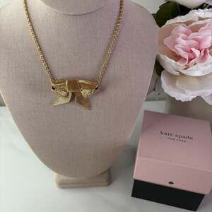 Kate Spade All Wrapped Up Gold Tone Textured Bow Necklace with Box
